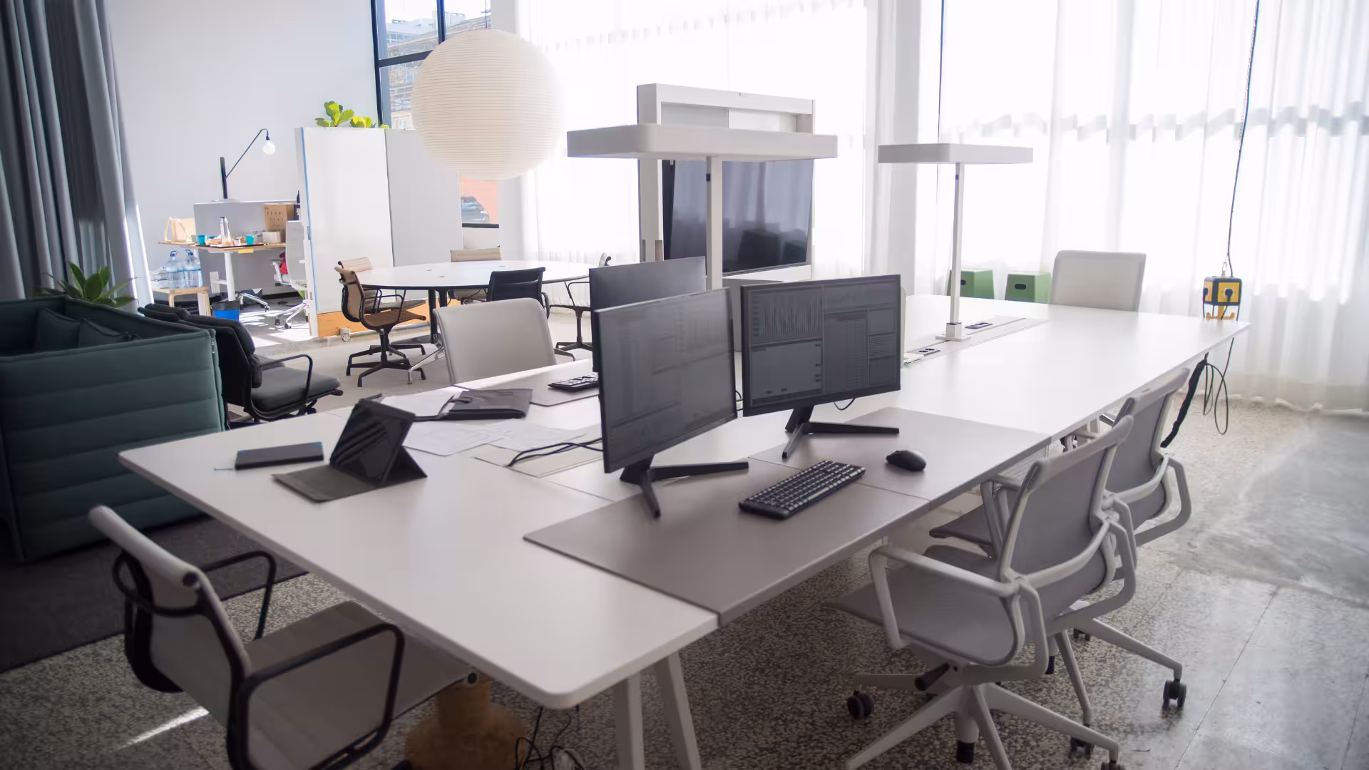 Professionals working in a modern shared workspace, illustrating a Step-by-Step Guide Setting Up a Virtual Office in Hyderabad.